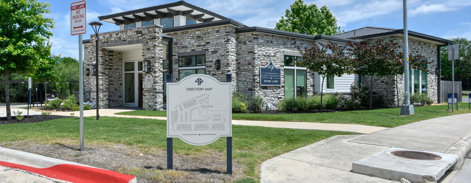 a sign in front of a building