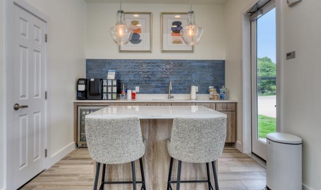 a kitchen with a marble countertop